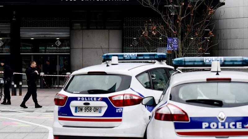 Police in front of the main entrance of the Pôle Universitaire Léonard-de-Vinci where John Dowling was stabbed to death. Photograph: Philippe Lopez/AFP/Getty Images