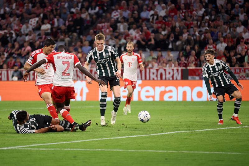 MUNICH, GERMANY - SEPTEMBER 20: Casemiro of Manchester United scores their sides second goal during the UEFA Champions League match between FC Bayern München and Manchester United at Allianz Arena on September 20, 2023 in Munich, Germany. (Photo by Alex Grimm/Getty Images)