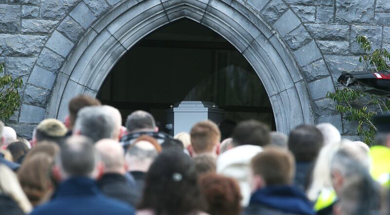 Katie Graham's coffin being taken into the church. Photograph: Stephen Collins/Collins Photos
