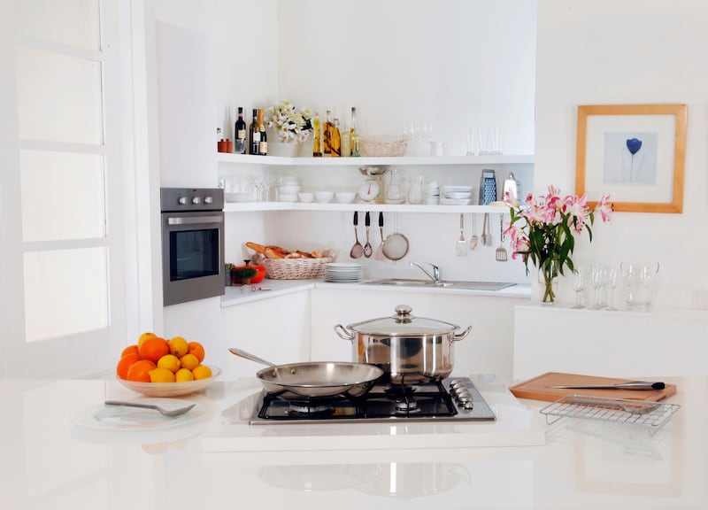Open shelving over counters is becoming more popular. 'It gives you a way to display your personality.' Photograph: Alamy/PA