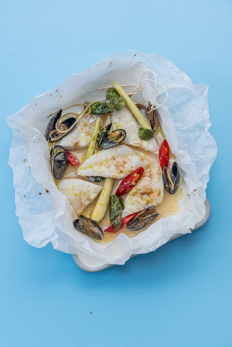 Asian style John Dory 'en papilote' with clams. Photograph: Harry Weir 