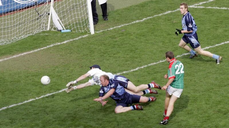 Mayo’s Andy Moran scores a goal past Stephen Cluxton and Shane Ryan in the 2006 game. Photograph: Donall Farmer/Inpho