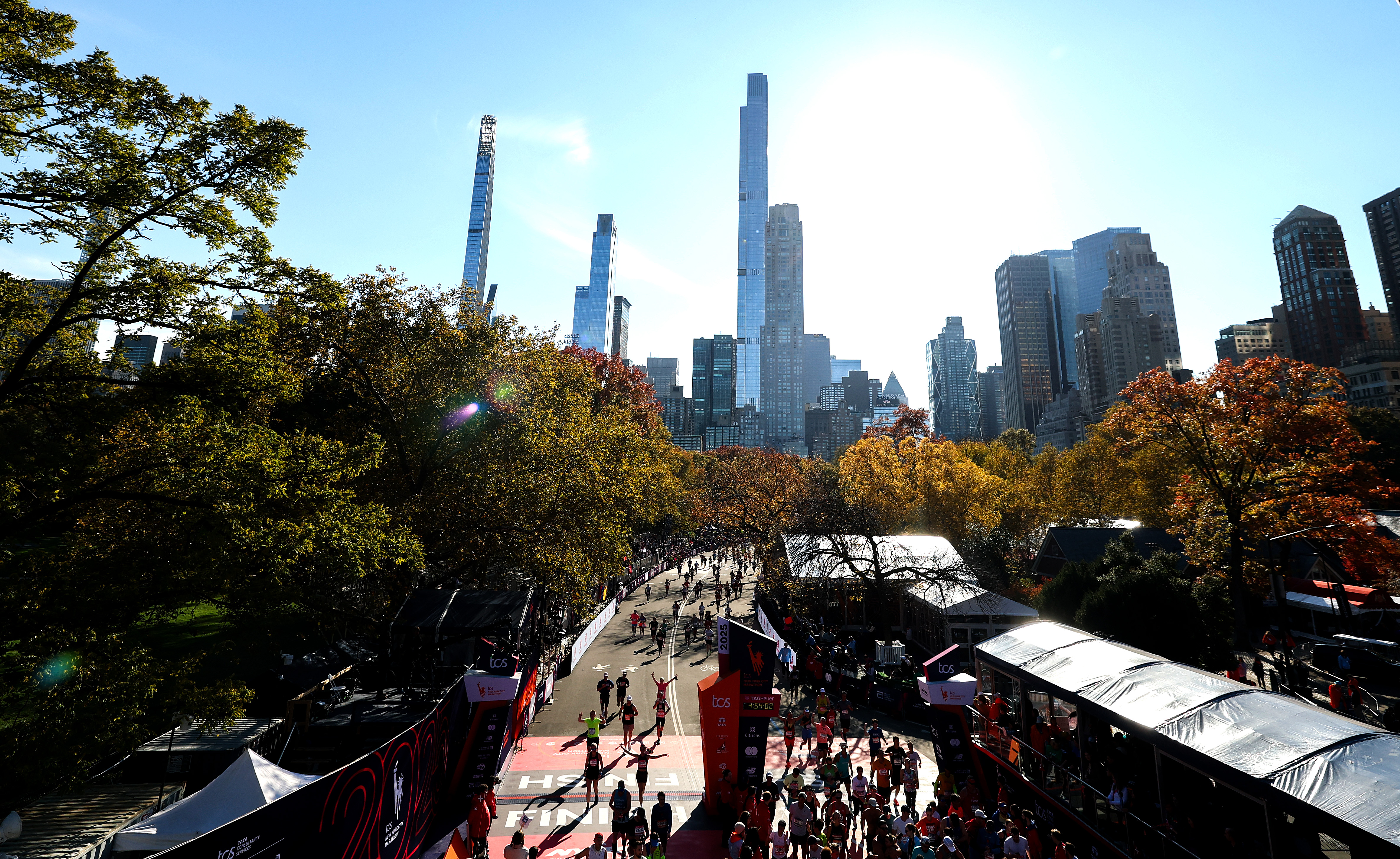 Competitors cross the finish line during the 2025 New York City Marathon. Photograph: Ishika Samant/ Getty Images