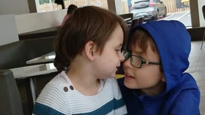 Twins Emmy and Max (6) have severe autism and are non-verbal.