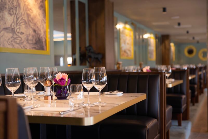 The dining room in the hotel is bright and airy