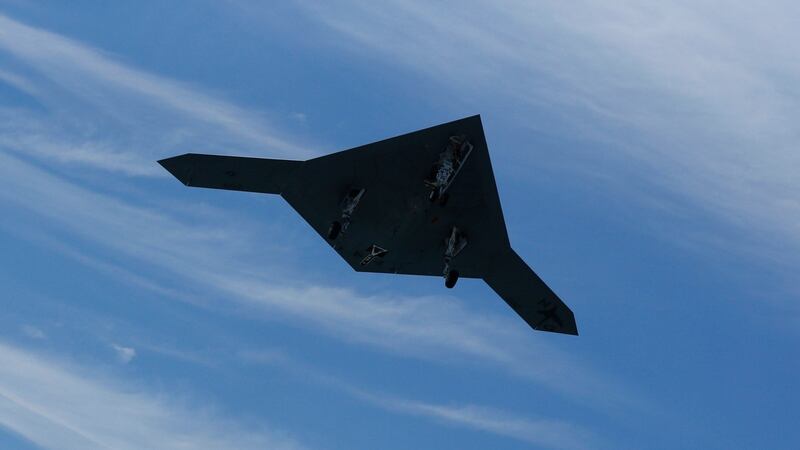 Killer robots are seen as the next step on from drones, unmanned aerial vehicles intended initially for surveillance bu adapted for carrying out targeted killings. Pictures is an X-47B pilot-less drone combat aircraft flying over the aircraft carrier, the USS George H. W. Bush. Photograph: Jason Reed/Reuters.
