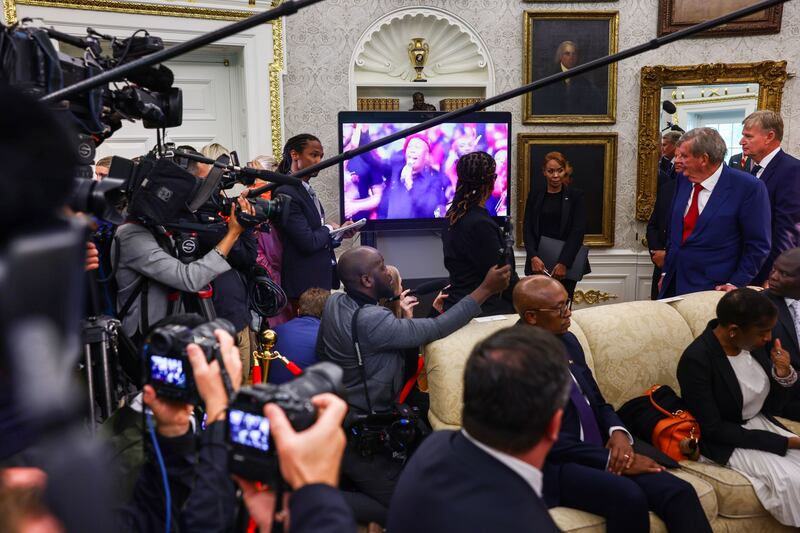 US president Donald Trump plays a video during his meeting with South African president Cyril Ramaphosa. Photograph: Jim Lo Scalzo/EPA
