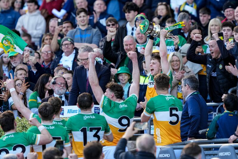 Lee Pearson lifts the Division 3 trophy for Offaly. Photograph: James Lawlor/Inpho
