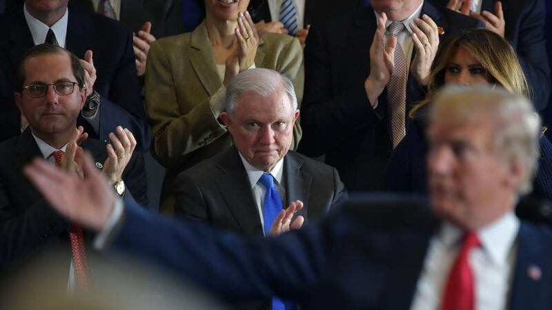 US attorney general Jeff Sessions with US president Donald Trump and first lady Melania Trump.  File photograph: Mandel Ngan/AFP/Getty Images