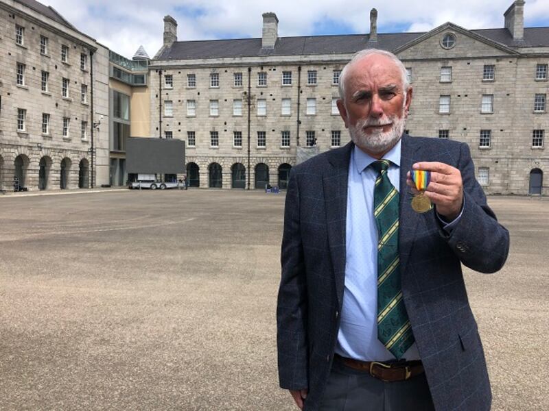 John Fox who says his grandfather - also named John Fox - was the only Irish man to serve in the first World War who won an all-Ireland hurling medal. His grandfather came from Newmarket-on-Fergus and won the hurling medal playing for Co Clare in 1914. He joined joined the Irish Guards in 1915. The county did not win the all-Ireland again until 1995. Mr Fox is pictured holding his grandfather's war medal. Photograph: Simon Carswell