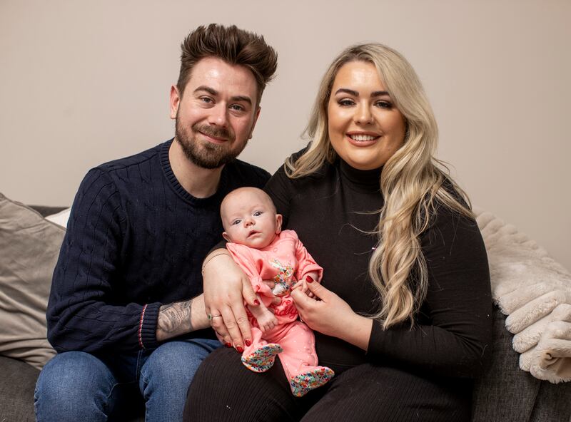 Marcus and Rachel Gilmore with their daughter Raina at their home outside Ballyclare. Photograph: Liam McBurney/PA