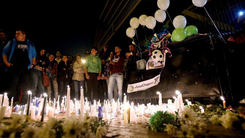 People attend a candlelight vigil for victims at the Nemesio Camacho Stadium in Bogota, Colombia, 29th November 2016. Photograph: Leonardo Munoz/EPA