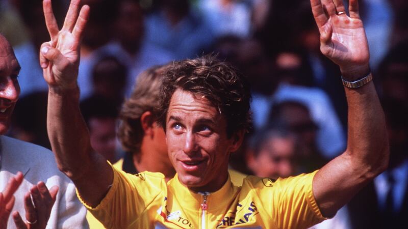 Greg LeMond celebrates his victory in the 1990 Tour de France. Photograph:   Tony Duffy/Allsport