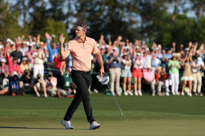 Moments later, Justin Rose birdies the 18th and signs for a 66 and the clubhouse lead at 11 under. McIlroy needs a birdie and a par to win, two pars for a playoff. Photograph: Richard Heathcote/Getty Images