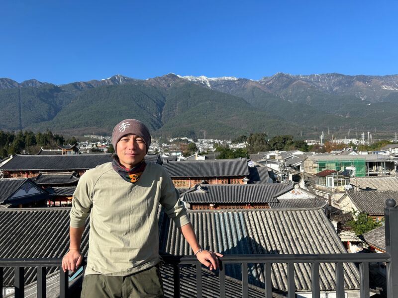 Li Yan on the rooftop of his restaurant in Dali: 'I have a better life over here.; Photograph: Denis Staunton