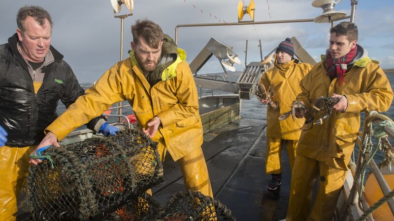 GAA players Aidan O’Shea, Colm Boyle and Lee Keegan  fishing off the Mayo coast.