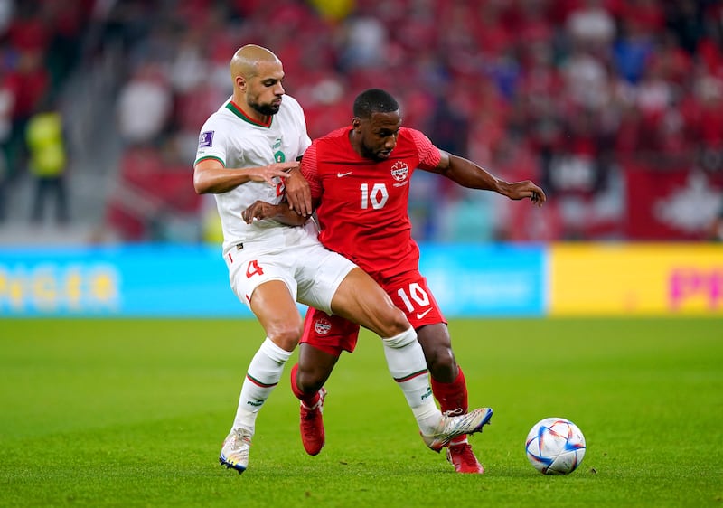 Canada's Junior Hoilett and Morocco's Sofyan Amrabat battle for the ball. Photograph: Mike Egerton/PA Wire  