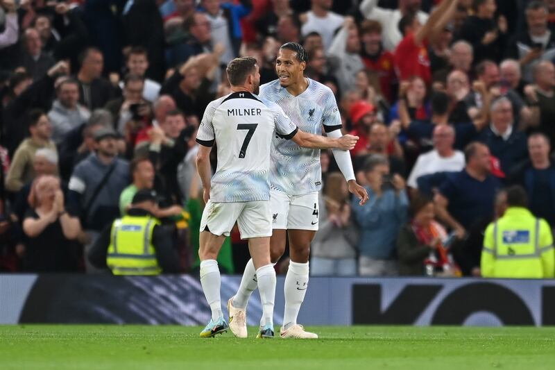 James Milner and Virgil van Dijk could be seen exchanging words after Jadon Sancho put Manchester United one goal up. Photograph: Michael Regan/Getty Images