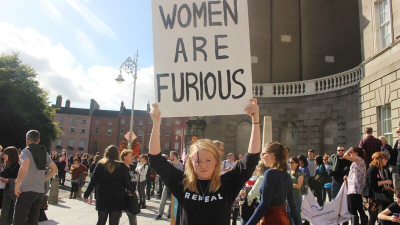 A Repeal the Eighth protester makes her point outside the Hugh Lane Gallery on Parnell Square ahead of the March for Choice in Dublin. Photograph: Ronan McGreevy