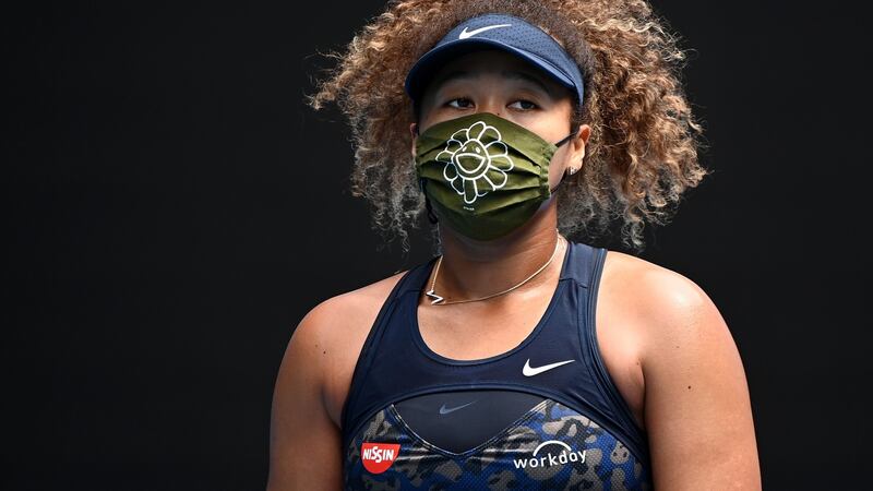 Naomi Osaka beat Garbine Muguruza to progress in Melbourne. Photograph: Quinn Rooney/Getty