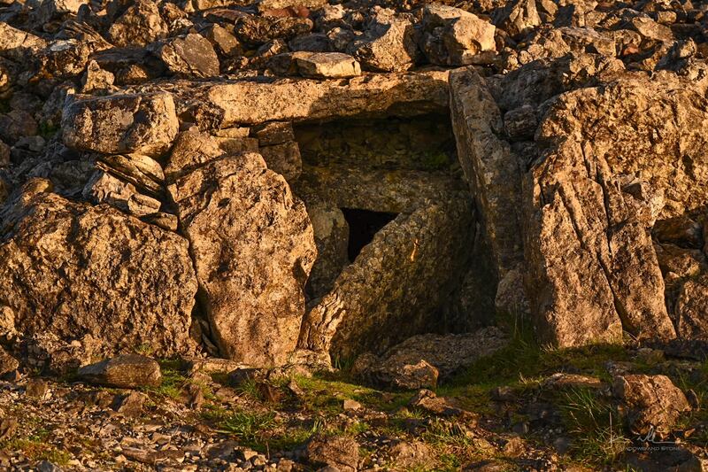 A stone at an entrance to a passsage tomb at Carrowkeel, Co Sligo was apparently pushed over at the weekend. Photograph: Kenneth Williams