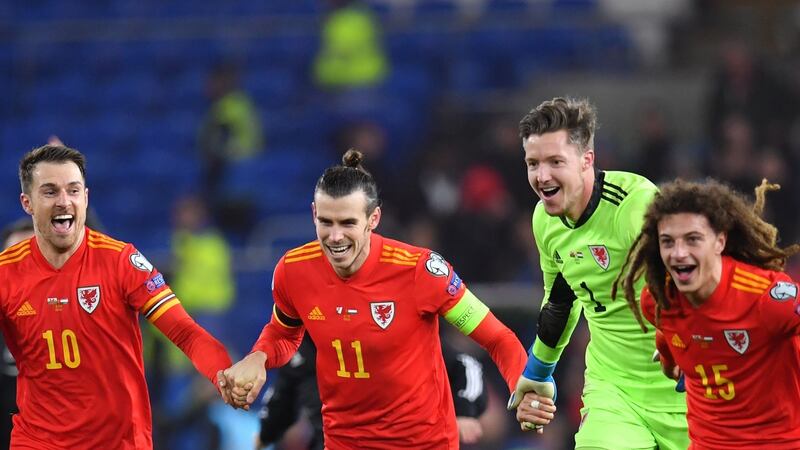 Gareth Bale and teammates celebrate last night.
