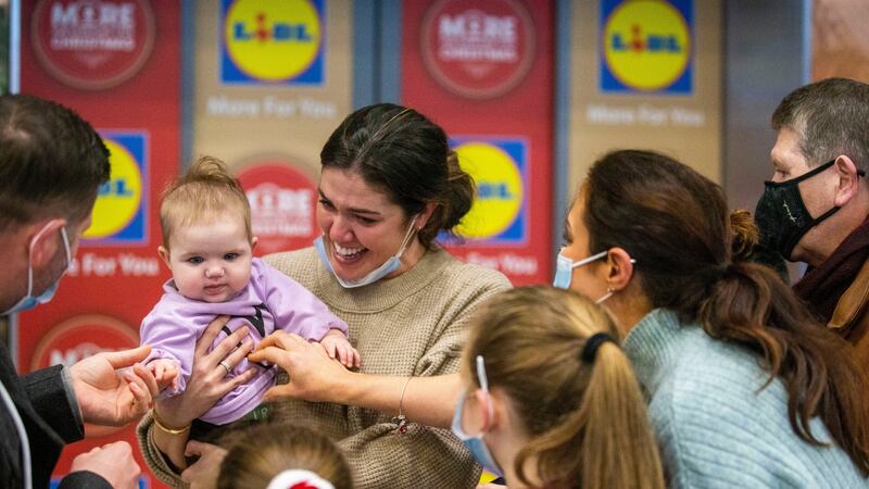 Together again: Tara Kelly and her daughter Ailbhe Kelly who lives in Georgia is greeted by her family. Photograph: Tom Honan