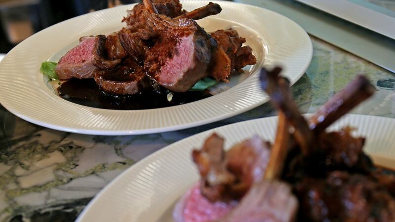 Rack of  lamb with   potato and onion cakes