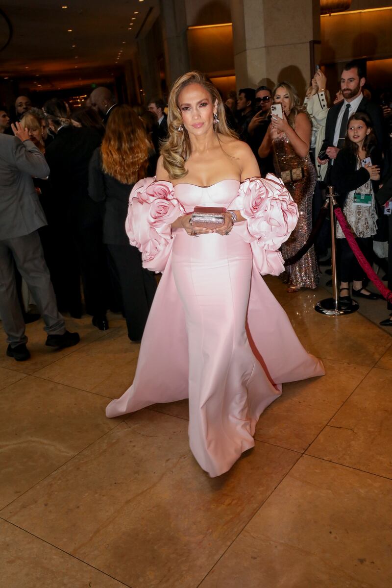 Jennifer Lopez's dress with baby pink rosettes. Photograph: Sinna Nasseri/New York Times
