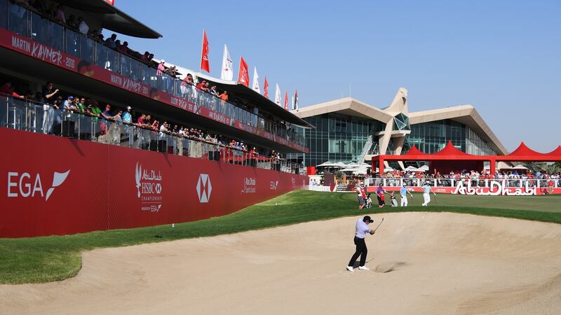 Dunne plays his third shot from a bunker on the 18th hole. Photo: Ross Kinnaird/Getty Images