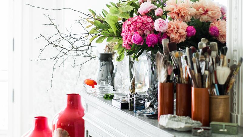 On the mantle is a Baccarat vase, one of his own designs from his Lights of Asia collaboration with the French crystal brand. Photograph: Eric Matheron-Balay