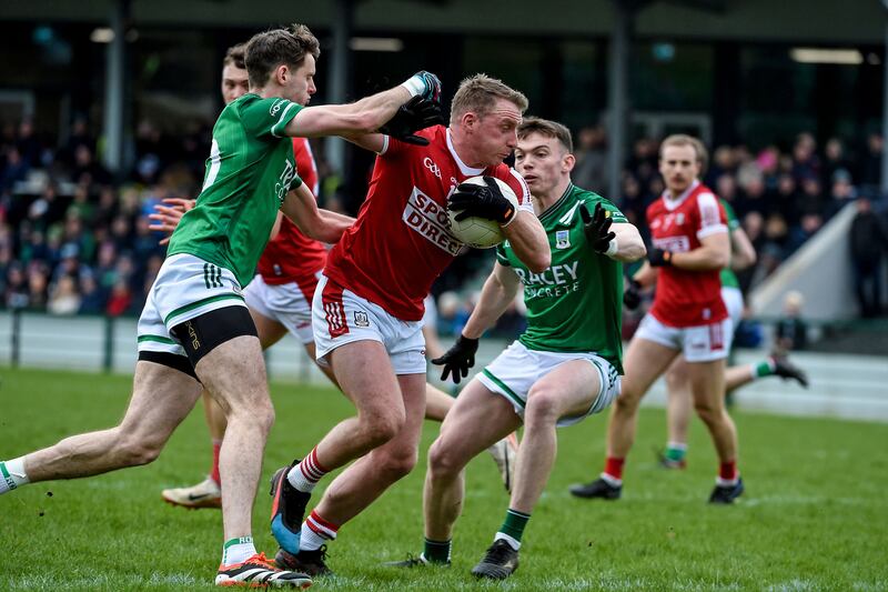 Brian Hurley of Cork with Conor McGee and Oisin Smyth of Fermanagh. Photograph: Andrew Paton/Inpho