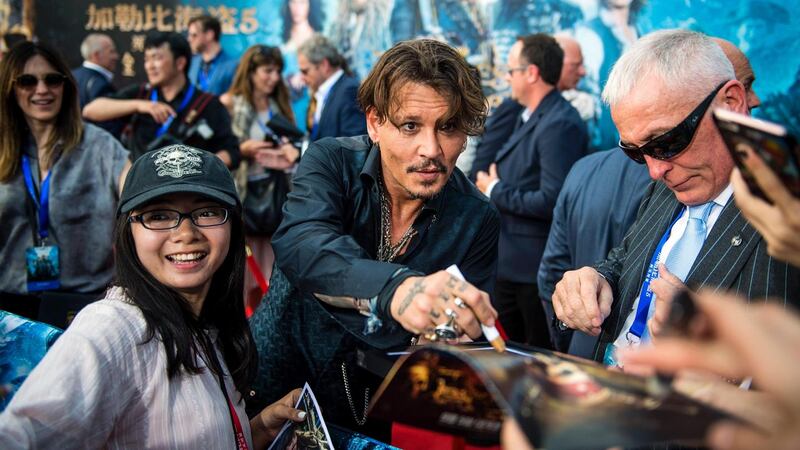 Johnny Depp at the world premiere of  “Pirates of the Caribbean: Salazar’s Revenge” in Shanghai. Photograph: Johannes Eisele/AFP/Getty Images