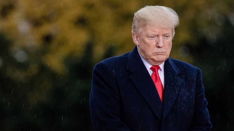 Donald Trump pauses during the American Commemoration Ceremony at the Suresnes American Cemetery in Paris, France, on Sunday Photograph: Marlene Awaad/Bloomberg