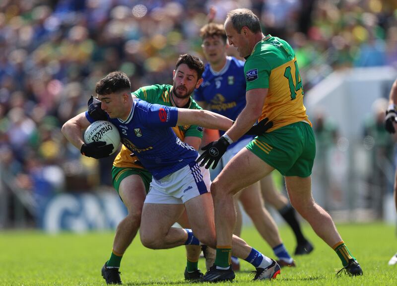 Donegal's Ryan McHugh and Michael Murphy tackle Niall Carolan of Cavan (left) in the GAA  All-Ireland Senior Championship, Round 2,  at Kingspan Breffni Park, Creighan, Cavan, in June. 
Photograph: Leah Scholes/Inpho