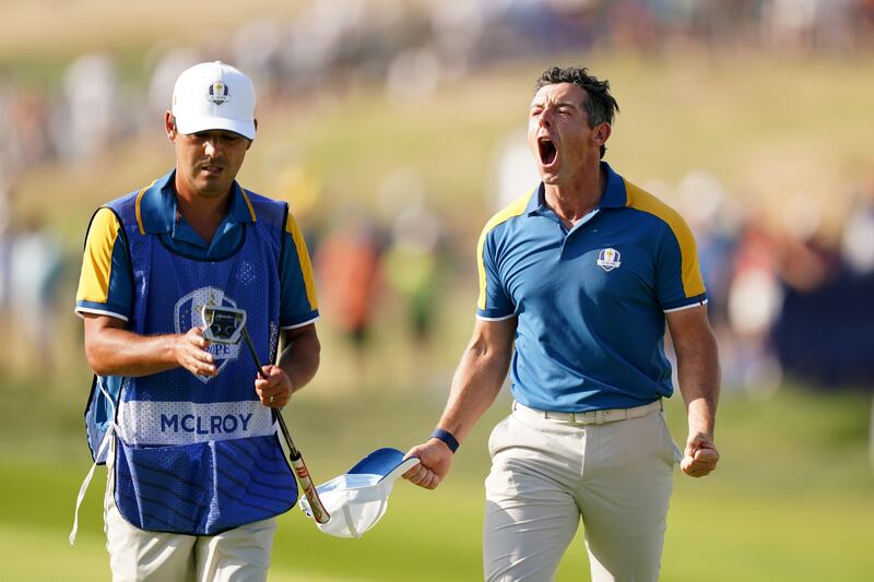 Rory McIlroy celebrates his birdie on the 17th green to complete a victory over Sam Burns of the United States in their singles match at the Ryder Cup. Photograph: Zac Goodwin/PA Wire