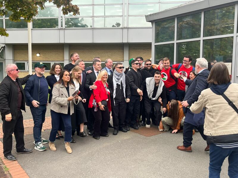 Liam Óg Ó hAnnaidh and supporters celebrating after Friday's court ruling. Photograph: Mark Paul