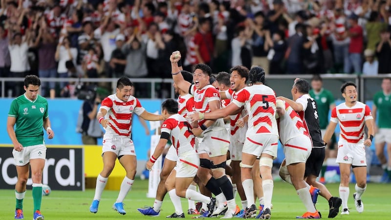 Japan’s players celebrate after the Rugby World Cup Pool A match against Ireland at the Ecopa stadium in Shizuoka. Photograph: EPA/Jiji Press