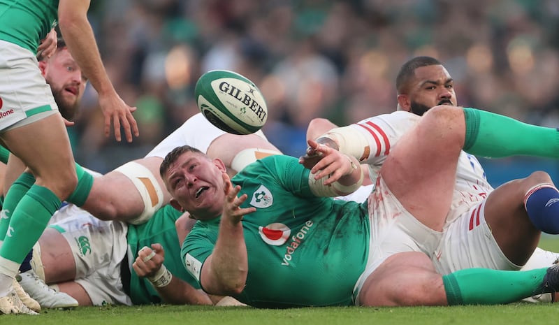 Ireland's Tadhg Furlong passes the ball during the game against England. Photograph: James Crombie/Inpho