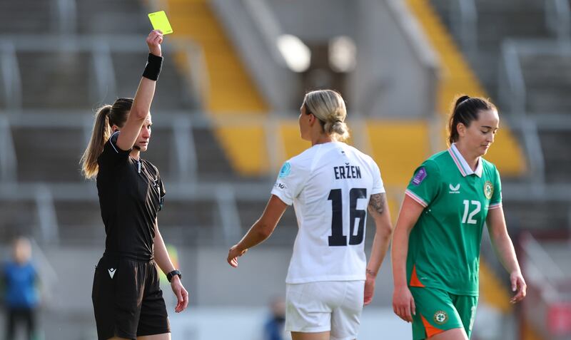 Referee Miriama Bočková shows a yellow card to Anna Patten of Ireland. Photograph: Ryan Byrne/Inpho