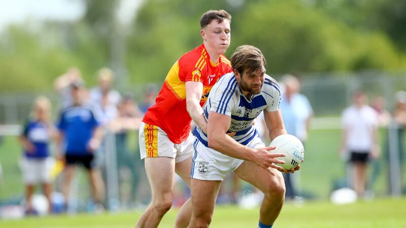 Castlebar’s Gavin Durcan and Aidan O’Shea of Breaffy in action during a Mayo SFC championship match. Photograph:  James Crombie/Inpho
