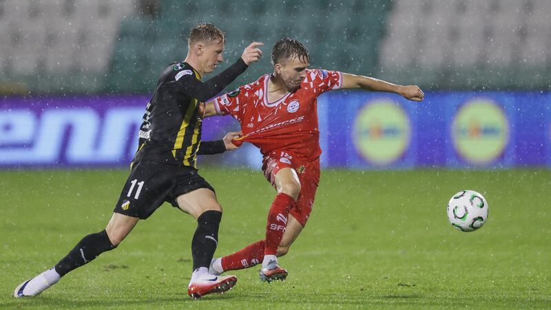 Shelbourne's James Norris and BK Hacken's Julius Lindberg. Photograph: Laszlo Geczo/Inpho