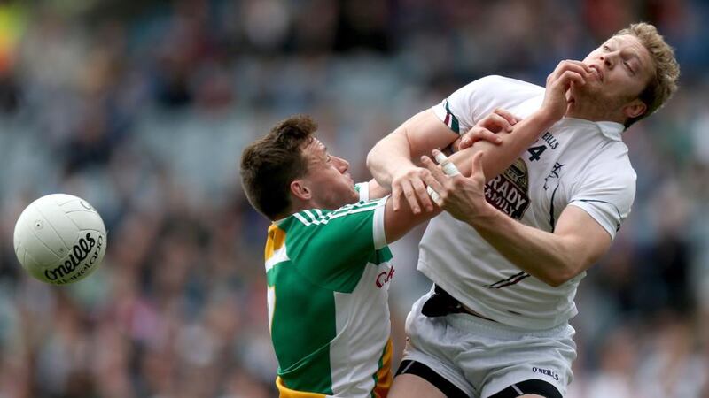 Offaly’s Michael Brazil and Tomas O’Connor of Kildare battle for possession at Croke Park.  Photograph: Ryan Byrne/Inpho