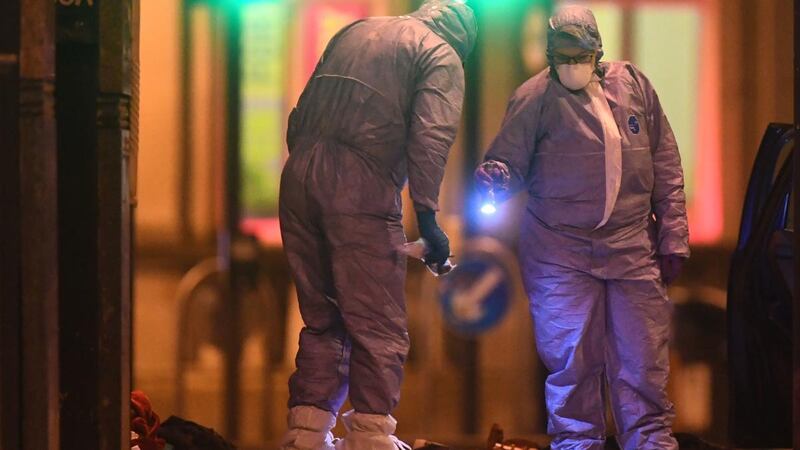 Police forensic officers work at the scene of a terror attack in Streatham High Road, south London after a man was shot dead by armed officers on Sunday. Photograph: Victoria Jones/PA Wire