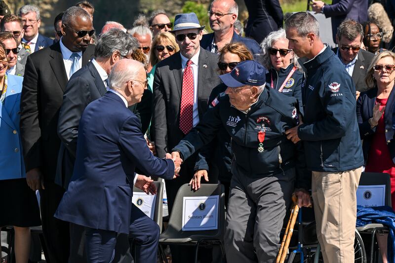US president Joe Biden greets second World War veterans during D-Day commemorations at the Pointe du Hoc Ranger Monument in Normandy, France, on June 7th. Photograph: Kenny Holston/New York Times