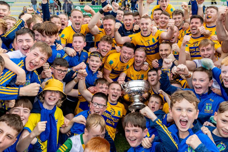 Summerhill players and supporters celebrate winning the Meath senior football title with victory over Ratoath at Páirc Tailteann in Navan. Photograph: Morgan Treacy/Inpho
