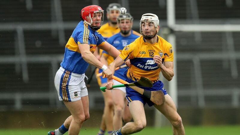 Tipperary’s Willie Connors and Ryan Taylor of Clare in action during the Co-op Superstores Munster Senior Hurling League Final at the  Gaelic Grounds in Limerick. Photograph: Ryan Byrne/Inpho