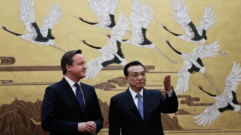 British prime minister David Cameron talks with Chinese premier Li Keqiang during the signing ceremony at the Great Hall of the People  in Beijing. Photograph: Lintao Zhang/Getty Images