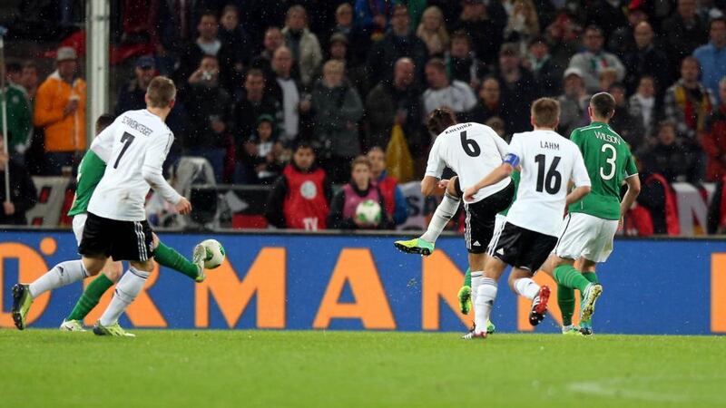 Germany’s Sami Khedira scores the first goal of the game via a deflection off Ireland defender Ciaran Clark in the World Cup qualifier in Cologne. Photograph: Donall Farmer/Inpho