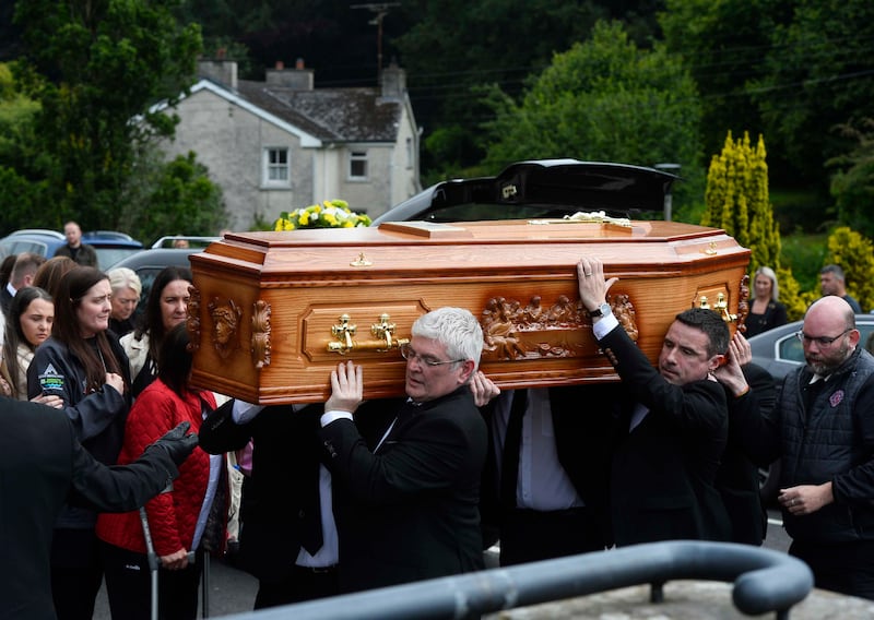 The coffin of Dáire Maguire is carried into the Church of the Immaculate Conception, in Newtownbutler, Co Fermanagh Photograph: Mark Marlow/PA Wire